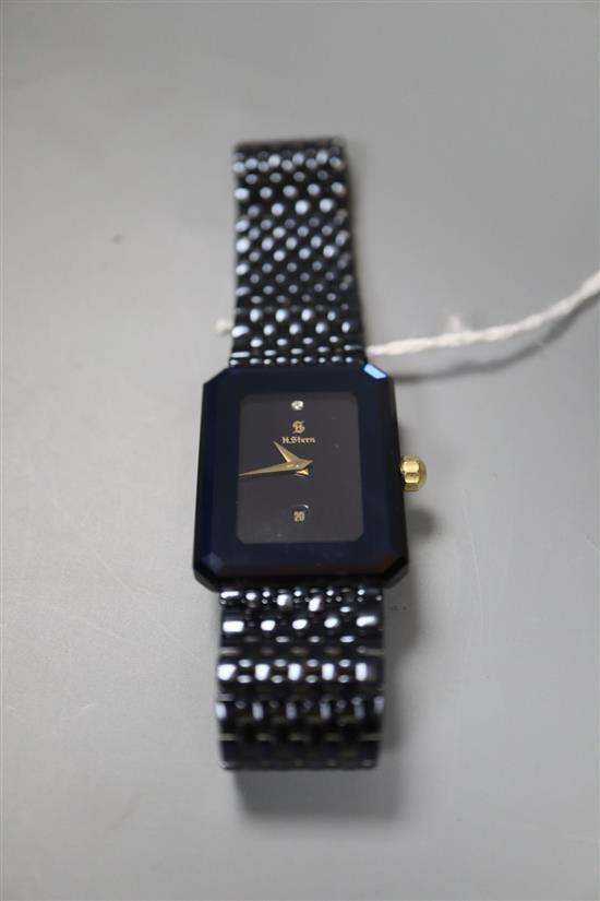 A gentlemans modern blued steel H. Stern quartz wrist watch, on a blued steel strap.